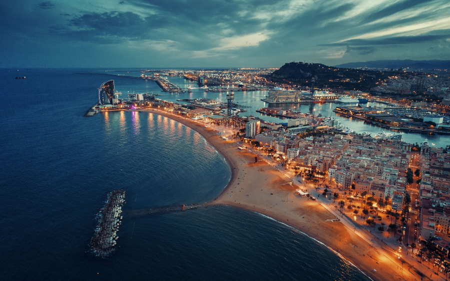 Skyline view of the Barceloneta Promenade at night