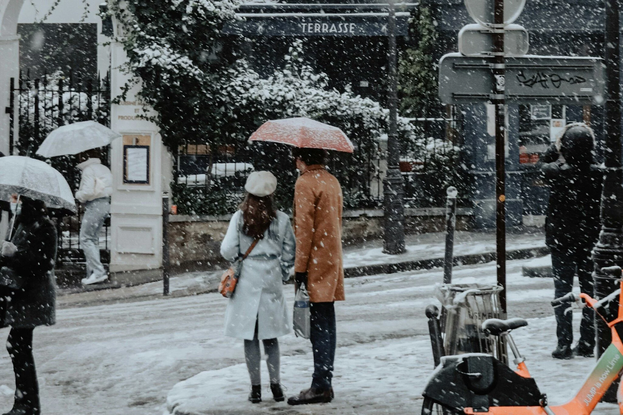 Couple in Paris in winter having a romantic walk