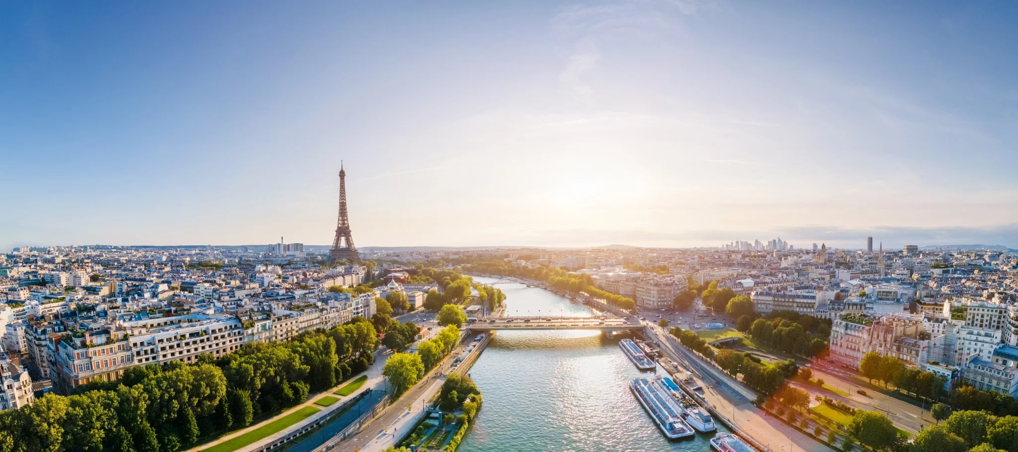 Paris with aerial views of the Eiffel Tower and River Seine, a top romantic travel destination in France.