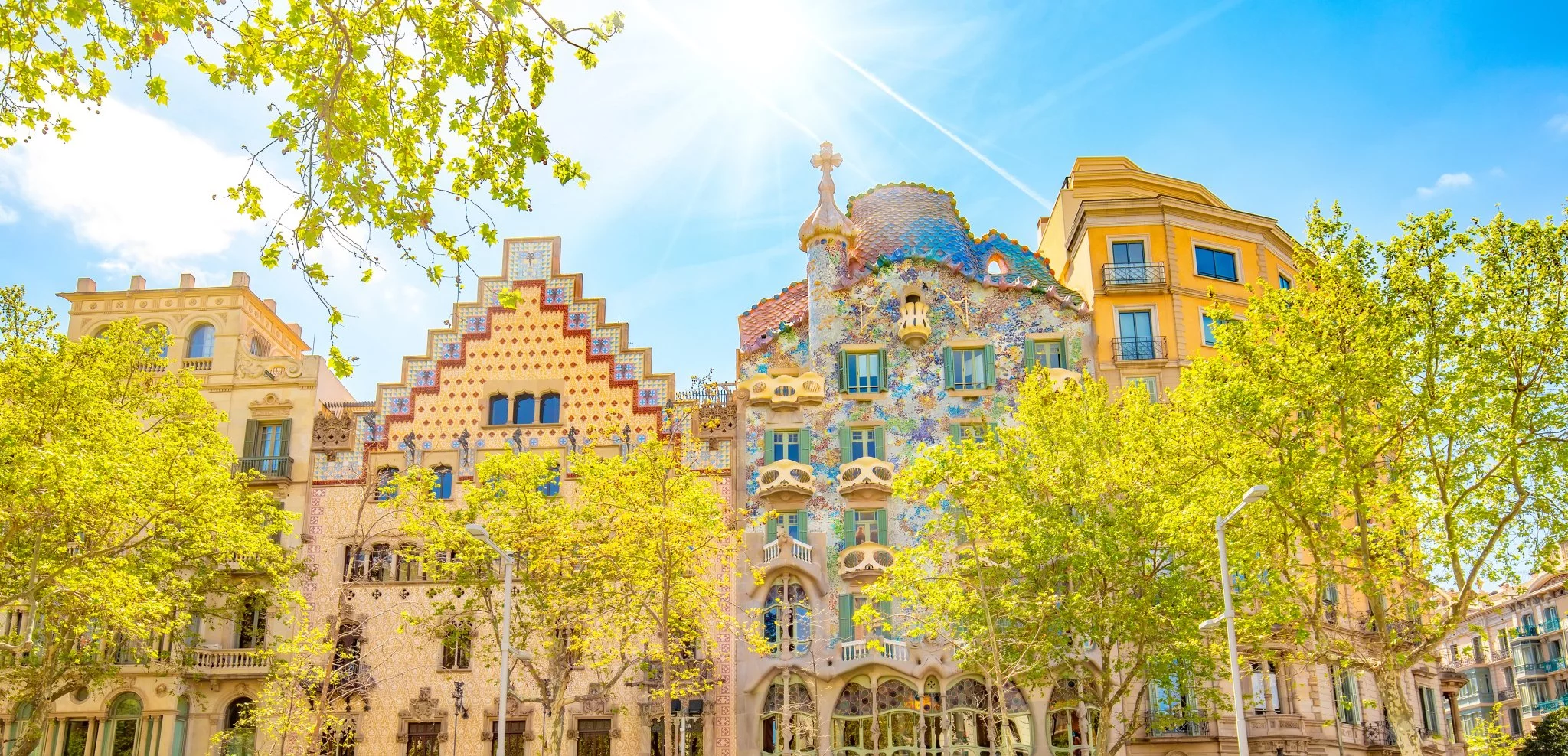 Colorful houses on famous Passeig de Gracia street, Barcelona city, Spain.